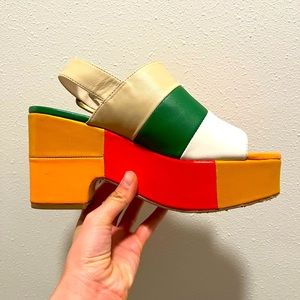Charlotte Stone “Elena” color block platform sandals.